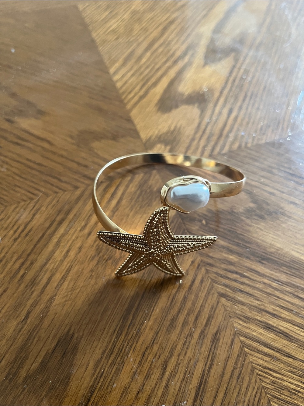 Gold Starfish Cuff Bracelet with White Stone Accent